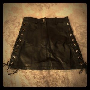 Genuine mini  black leather skirt